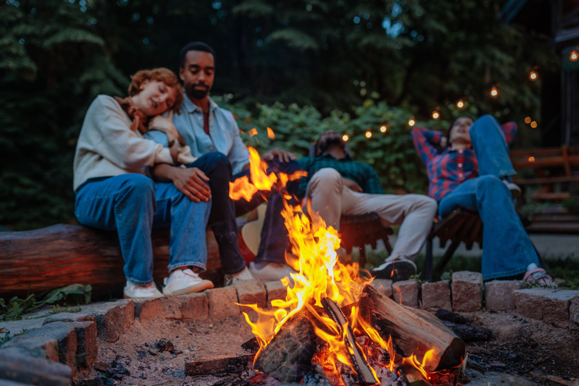 People enjoying a fire pit in north facing garden