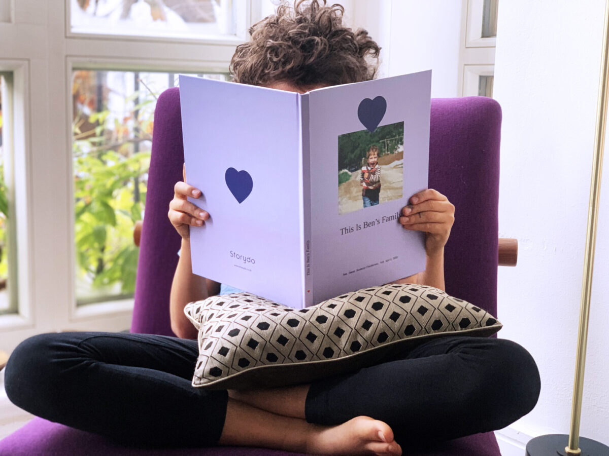 Child reading a Storydo Book high-res