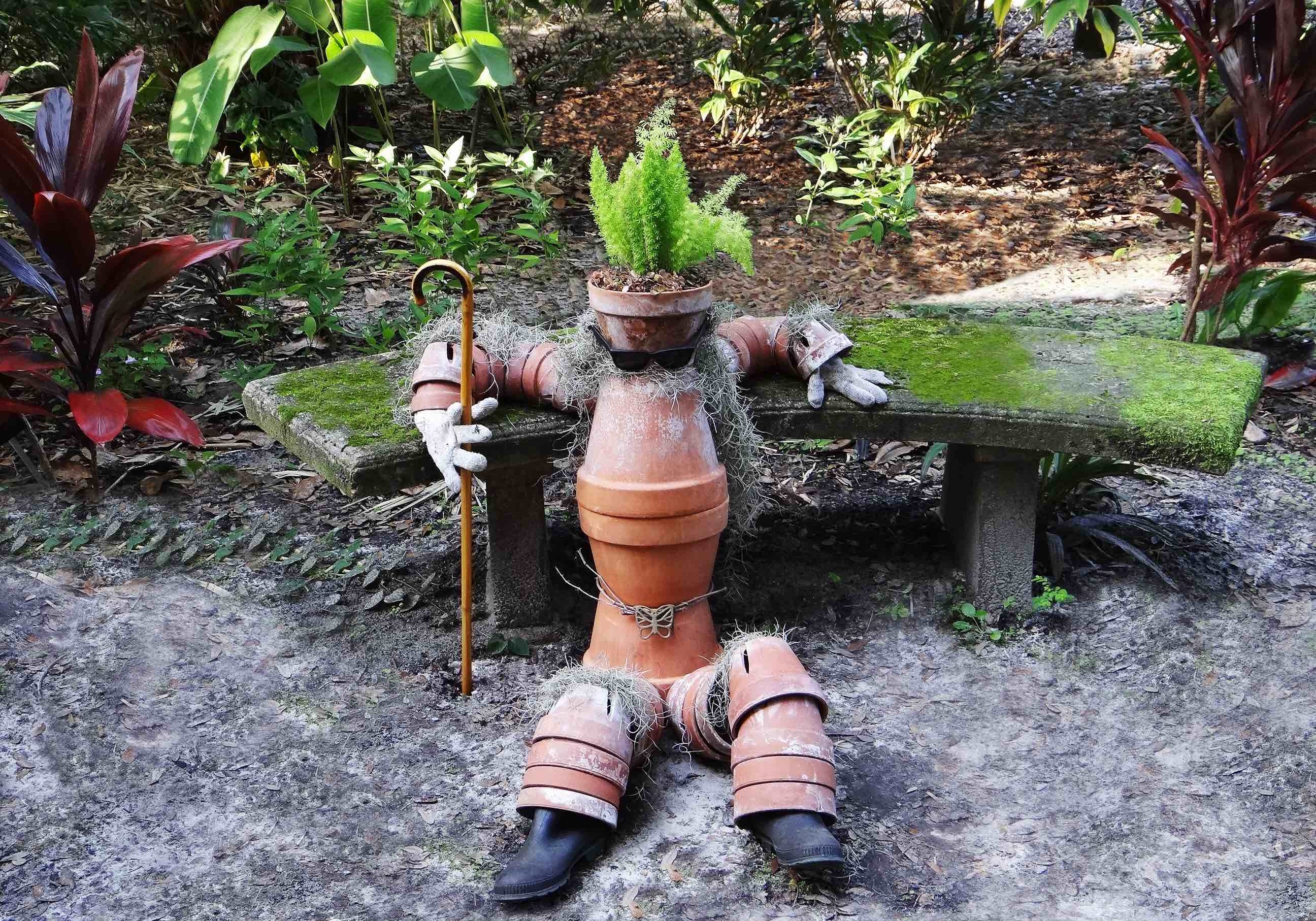 Man made of clay pots